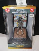 Front view of original box showing fine pewter Wonder Woman statue standing on sunburst base with DC Comics logos and Comic Book Champions branding.