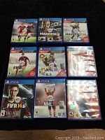 Photo showing 9 PlayStation 4 sports games arranged in a 3x3 grid on a dark surface.