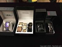 Four ladies quartz watches shown in their original boxes, including Seksy, Kessaris with extra bands, and Cronotech watches.
