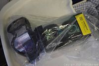 Sundance Kid kids snow goggles in clear packaging showing black frame and tinted lenses