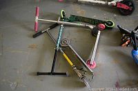 Top view of all three scooters showing Combat, Razor and Speed Limit brands.