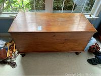 Closed cedar chest with natural wood finish