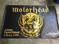 French Motörhead poster laid flat showing design and wear