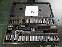 Top view of Craftsman socket set in black plastic case showing ratchet wrench, 27 sockets, and 2 extensions arranged neatly inside.