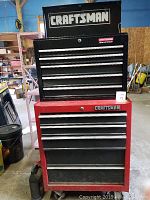 Full view of the stacked Craftsman tool chest and lower cabinet showing branding and drawer configuration