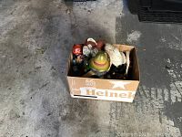 Box of assorted figurines and collectibles as viewed from a distance