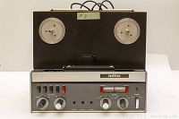 Front view with reels mounted and control panel visible