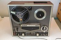 Front view of Toshiba PT-862D reel to reel tape recorder showing the large reels, control panel, and various knobs and inputs.