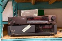 Sony PCM701ES digital audio processor on top of JVC HRS5000U Super VHS VCR with Fluke 52 K/J thermometer box on top. Visible settings and front controls.