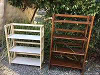 Two folding wooden bookshelves shown side by side outdoors, one beige and one brown.