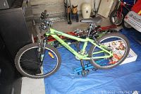 Full side view of the Rocky Mountain bike showing frame, tires, saddle, and handlebar.