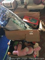 Boxes containing child's toys including plush animals, bedding and boxed toys