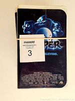 Front cover of Casper VHS tape showing three blue ghost characters, taped with auction lot number tag.