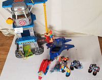 Wide shot of Rescue Heroes Command Center playset with yellow crane, blue jet, red rescue boat, and five action figures arranged in front.