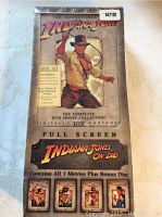 Photo of unopened Indiana Jones DVD box set featuring classic cover art of Indiana Jones with whip.
