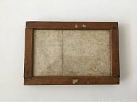 Front view of the wood Kodak Maskit printing frame showing translucent surface for positioning photographic negatives.