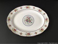 Oval Royal Albert Petit Point bone china serving platter with floral pattern and gold trim shown from above on neutral background.