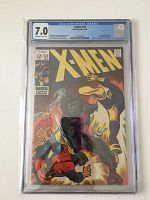 Front cover of X-Men #53 showing the comic grade 7.0 by CGC with classic action scene cover art featuring several characters.