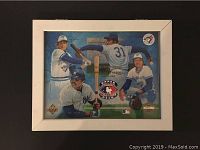 Front view of limited edition print showing four Blue Jays baseball players in action framed in a white frame.