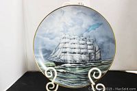 Front view of the fine china plate showing the full sailing ship scene with cloudy sky and waves.