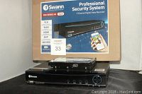 Swann Professional Security System box, DVR device, and Western Digital hard drive displayed together.