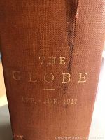 Spine of the bound volume showing title and date period in gold embossing.