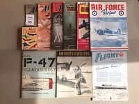 Multiple vintage aviation magazines arranged flat including 'The Aeroplane' and 'Air Force Review'