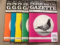 Front covers of 5 vintage Pigeon Racing Gazette magazines from 1974, May to July issues showing colorful solid backgrounds and pigeon images.