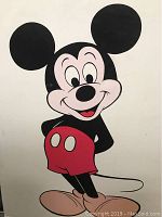 Close-up of the Mickey Mouse cartoon character on the poster