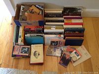 Overview of stacked books focusing on Mackenzie King with some other titles mixed in
