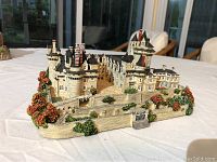 Ussé Castle detailed view showing turrets, chimneys, and landscaping on base