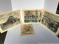 Lot of five prints laid out including three Paul Norton prints and one Shane 1984 print of Cocker Spaniel dog. Prints show yellowing and some wear with pin holes in corners.