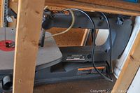 Side view of Craftsman scroll saw showing brand label and model details.