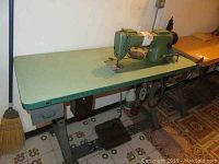 Full view of machine head, table and stand