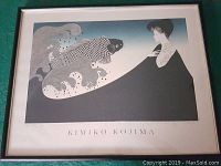 Framed print showing woman and koi fish with title and artist name below image.