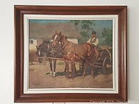 Full view of the framed oil painting showing two horses harnessed to a cart with a man seated on it in a rural Hungarian farm setting.