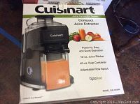 Photo of the Cuisinart Compact Juice Extractor box showing the product image and features.