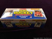 Top and side view of sealed 1990 Score NHL Hockey Premier Edition collector box showing branding and card count with Eric Lindros featured on the box.