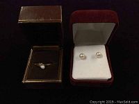 Full lot showing the 14K gold pearl ring in a brown box and pearl earrings in a red box.
