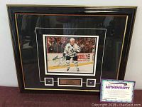Framed signed Mats Sundin photograph with certificate of authenticity and nameplate.
