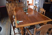 Overview of dining table, chairs and rug