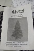 Assembly instructions booklet for 6.5 to 7.5 foot pre-lit Instant Shape trees showing tree image and features.