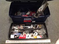 Alternate angle of Mastercraft toolbox with visible tools and hardware including Stanley hand planer