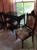 Table and chair together by window
