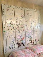 Full view of four connected decorative panels featuring pastel floral and bird motifs on ivory background.