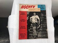 Front cover of the March 1963 Hockey magazine showing a hockey goalie in uniform standing on stairs and various headlines.