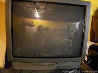 Front view of the 32 inch JVC CRT television showing the screen and overall condition.