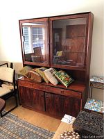 Front view of hutch with upper glass doors and lower cabinets