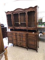 Front view of two-piece cabinet assembly showing base and hutch