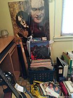 Vinyl crate with LPs, posters including The Crow movie poster